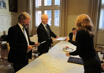 Herber and Schomaker are presented with the awards by Clara Coepijn
