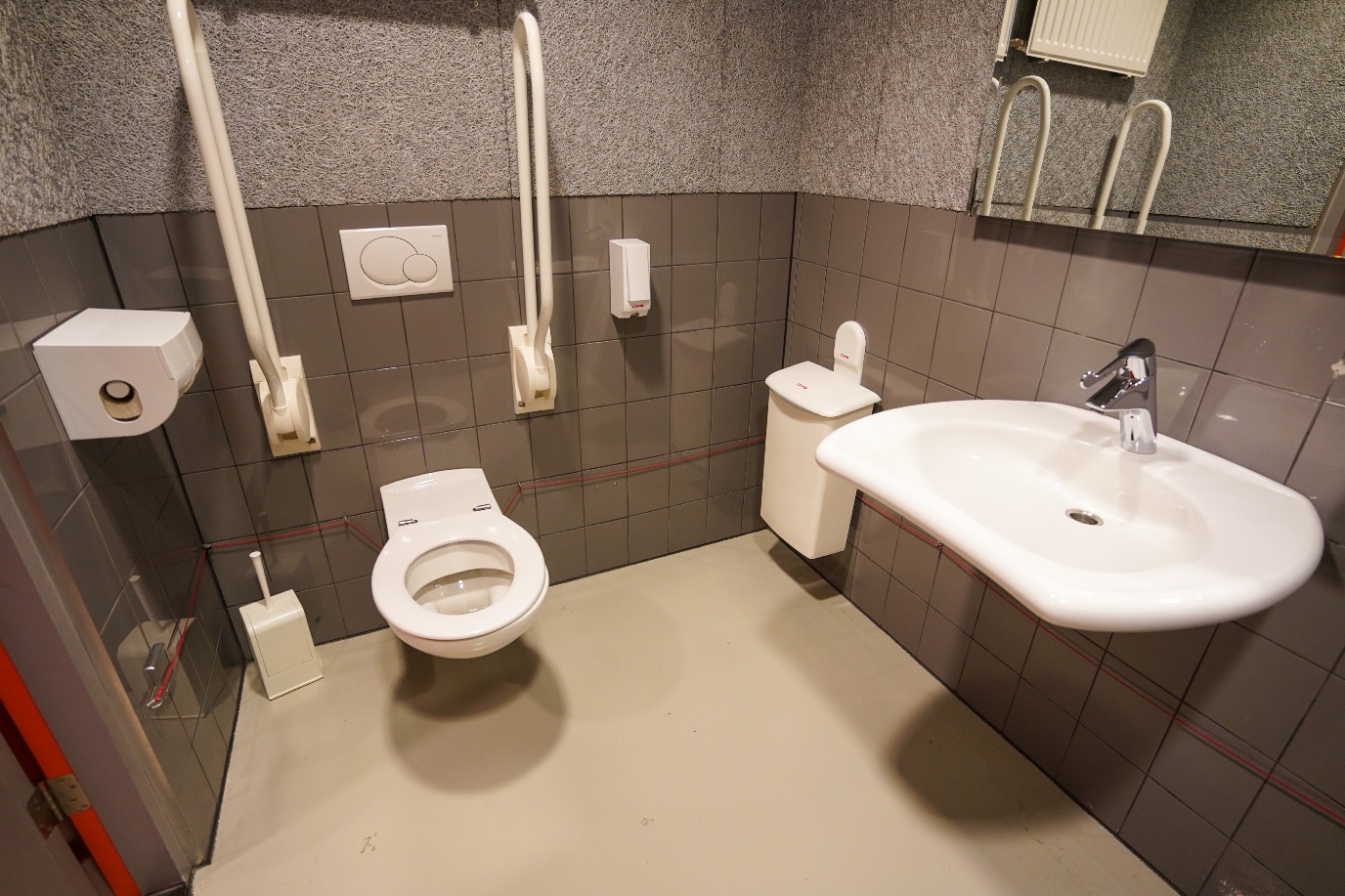Wheelchair-friendly toilet in exam section building