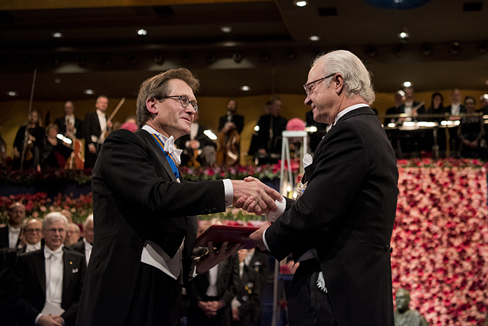 Ben Feringa receives the Nobel Prize from Swedish King Carl Gustaf. Copyright © Nobel Media AB 2016. Photo: Pi Frisk.