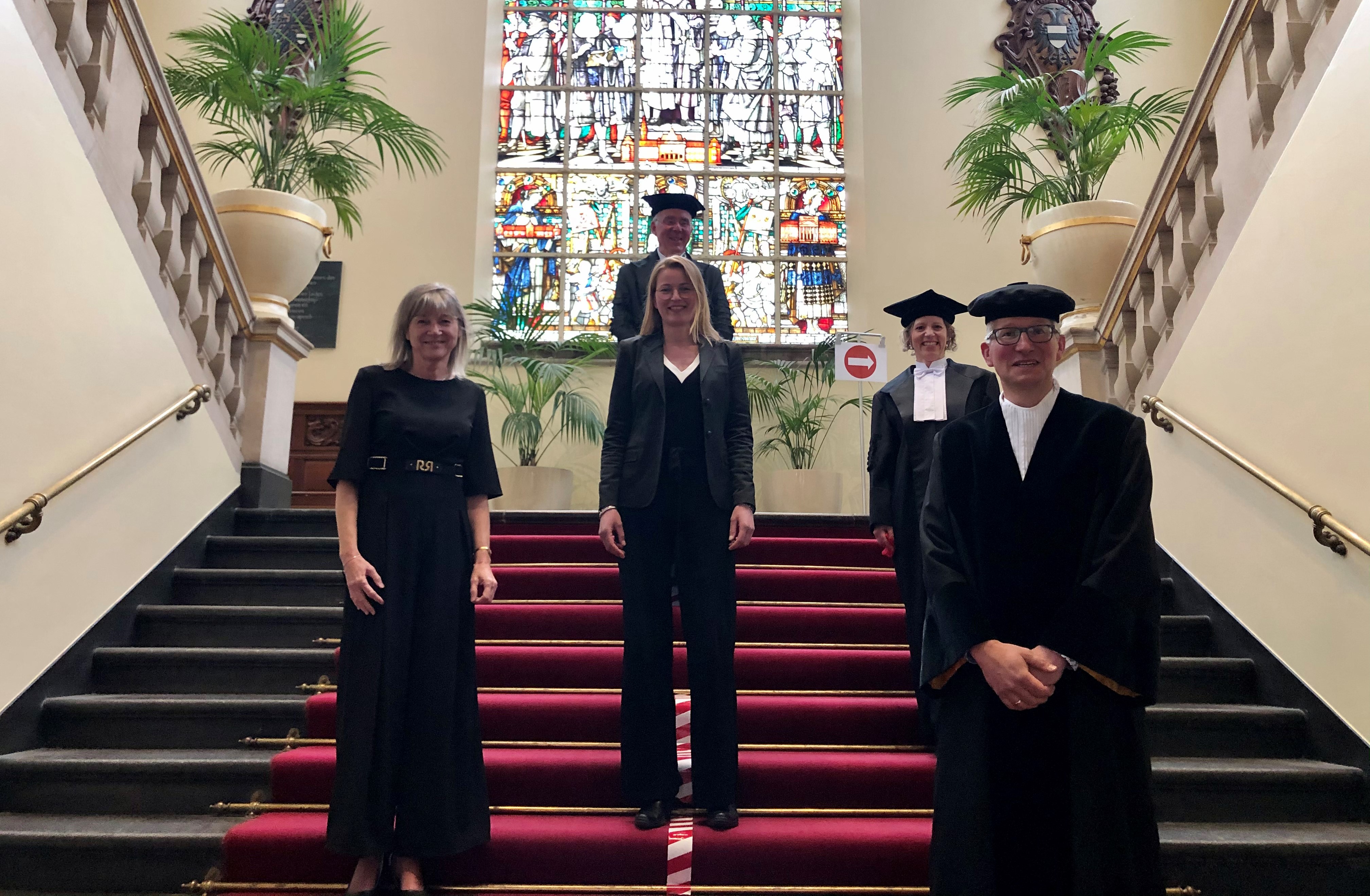 Frontrow: Janny Hoekstra (left), Bianca Harms (center) and Tammo Bijmolt (left) at Harms' PhD ceremony in 2021