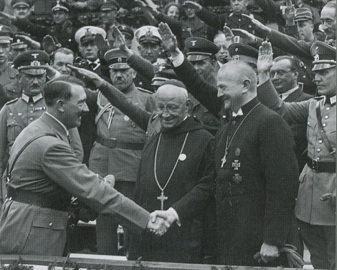 Hitler shaking the hand of clergy men