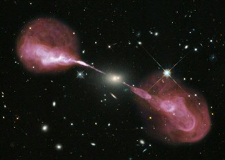 Probably all galaxies have a supermassive black hole (SMBH) in their centre. When the SMBH accrete matter they will produce a jet, which expels part of the inflowing matter. These jets are very prominent in radio and X-ray emission and can be thousand times larger than the galaxy itself. Image credit: NASA, ESA, S. Baum, C. O'Dea, R. Perley, W. Cotton, and the Hubble Heritage Team.