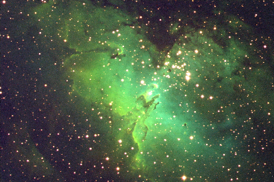 Here we have a recording of the Eagle Nebula, a star formation area in the Milky Way. The 'false colours' show how the hydrogen gas, oxygen gas, sulphur gas and dust are distributed. A group of newly formed bright stars is located right above the centre. These stars are lighting up the gas clouds in the nebula. In order to create this image, the CCD was illuminated 2x30 minutes through the [OIII] filter (blue), 1x30 minutes through the H-alpha filter (green) ans 2x30 minutes through the [SII] filter (red).