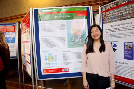 Caecilia Satyawan next to her poster on Dirty Laundry | Photo Science LinX