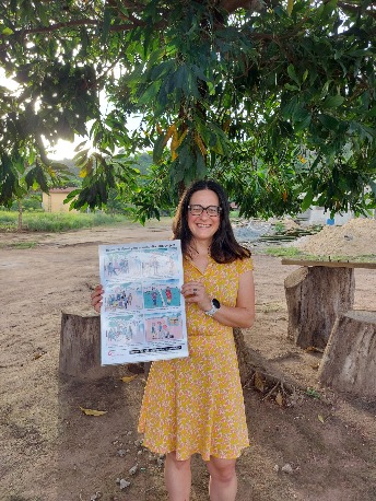 Dr. Ryan with the poster for Sierra Leone