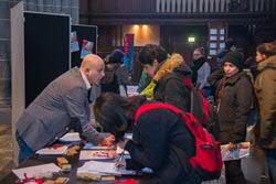 Students at the information market