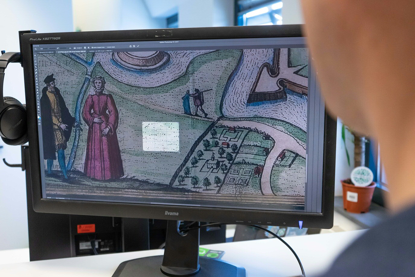 Cutting and pasting: cutting the green areas from the old map and pasting them onto all the green spaces in the new map.