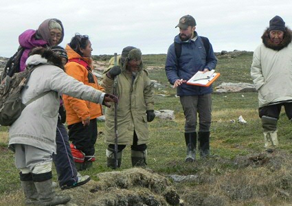 Inuit elders are showing Dejardins an old sod house site