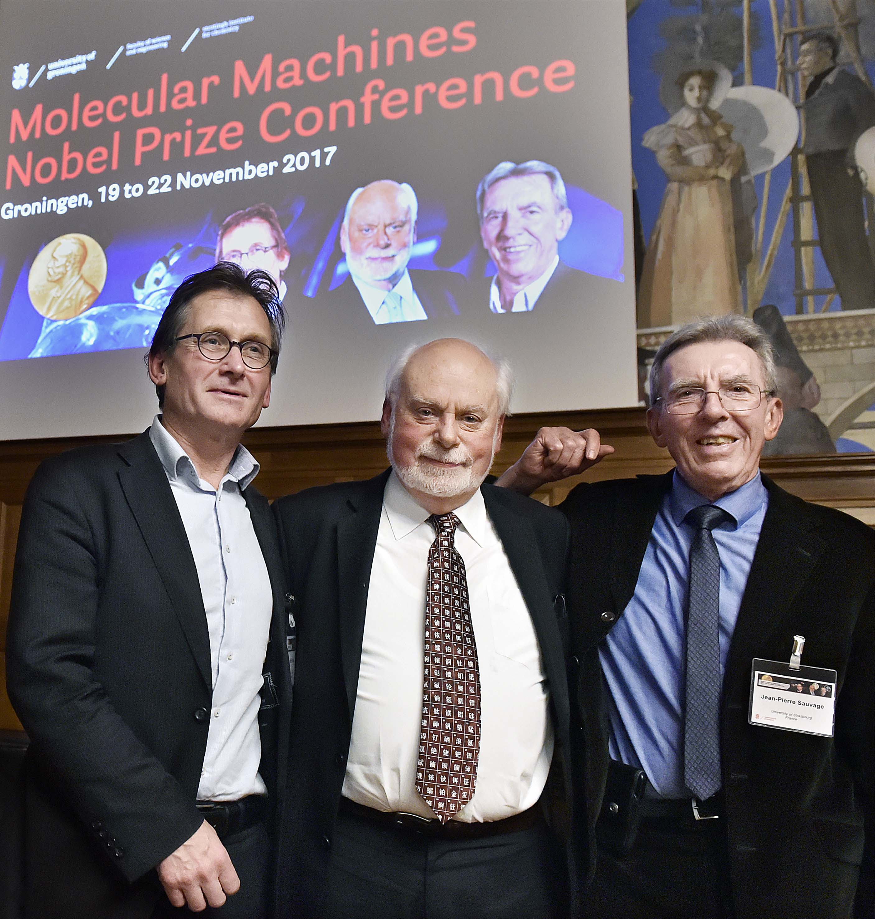 21 november 2017: Nobelprijswinnaars Ben Feringa, Fraser Stoddart en Jean-Pierre Sauvage (Nobelprijs scheikunde 2016) in de aula van het Academiegebouw.