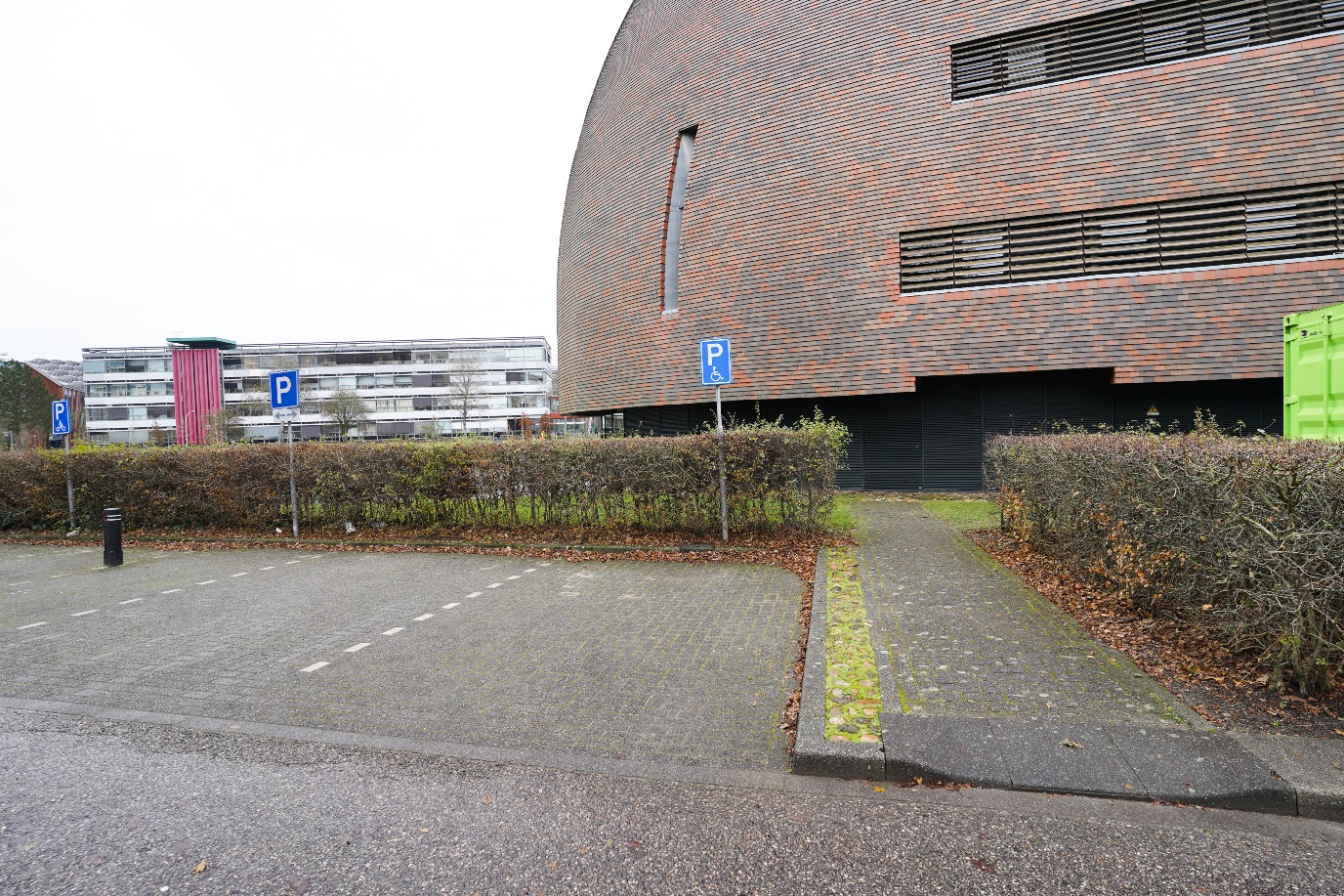Parking place on site for people with (physical) disabilities, left of main entrance