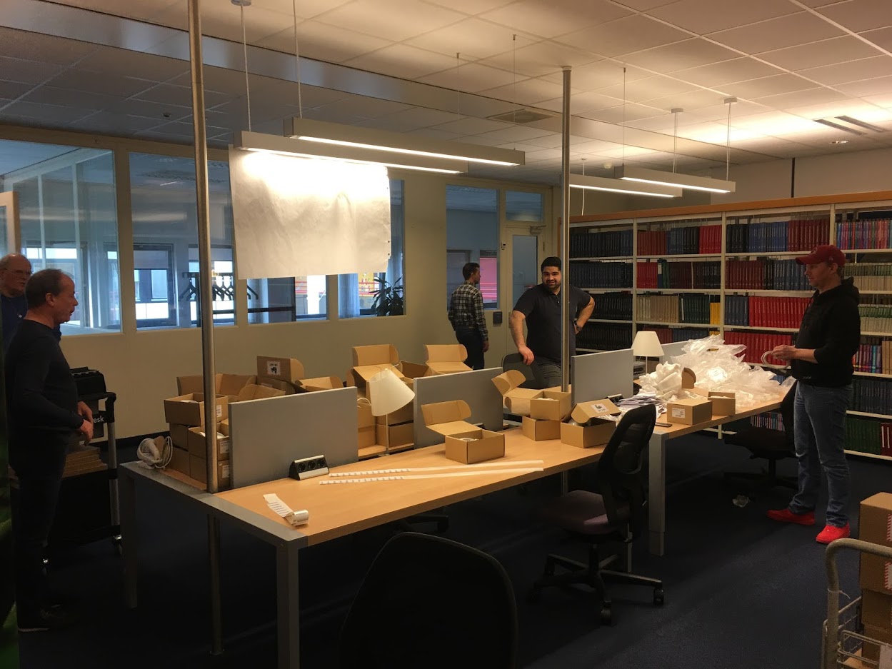 Laptops between the journal cabinets