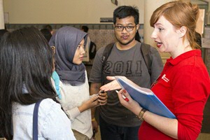 Students looking at brochures