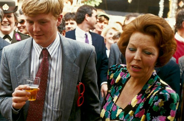 Young Prince Willem-Alexander having a beer in front of the Academy Building
