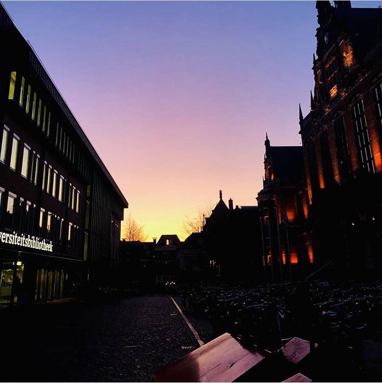 The sun sets perfectly in between the Academy Building and the UB. Courtesy of @ditisgroningen