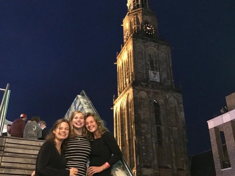 Additional bucket-list activity: enjoy the view of the Martini Tower from the VVV building on the Grote Markt