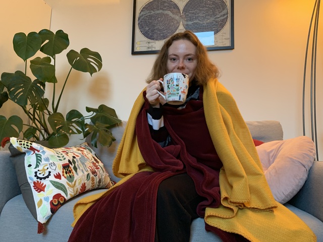 Hylke staying warm with loads of blankets and a cup of tea.