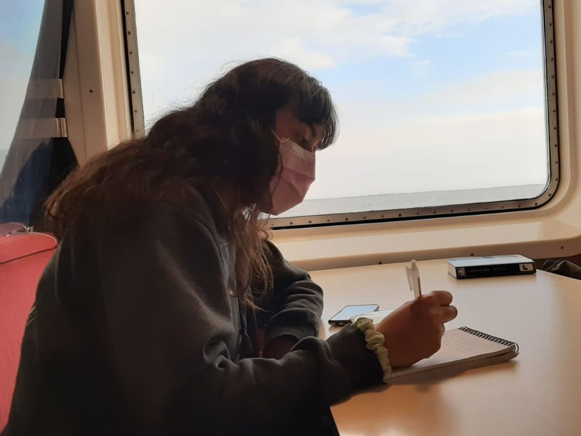 Here I am making the most out of my time on a ferry by making a checklist of tasks to do!