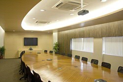 Board room with empty chairs