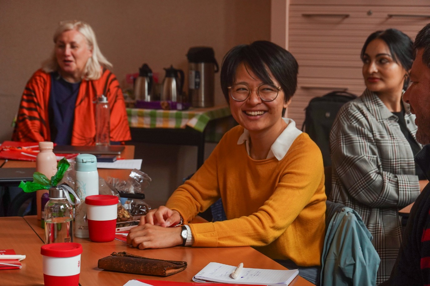 Participant laughing in classroom