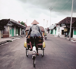 Vietnamese man on bike