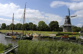 Boats and a mill