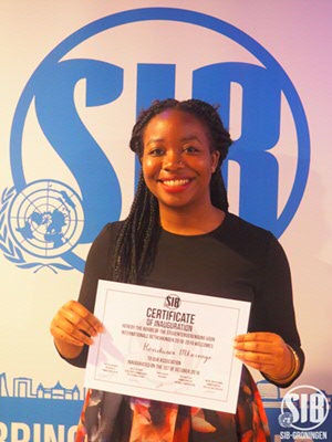 Kondwani with her SIB certificate of inauguration