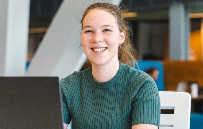 Friendly Student with laptop