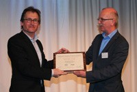 Prof. Ben Feringa receives the certificate form prof. dr. Eelco Vogt.