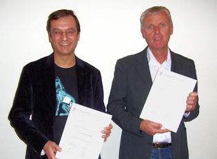 Prof. Anton Scheurink (right) and Prof. Kanat Camlibel (left)
