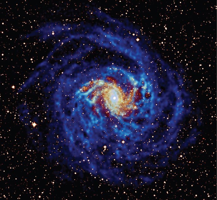 Neutral hydrogen (blue) in the galaxy NGC6946, observed with the Westerbork Synthesis Radio Telescope (WSRT), superposed on an image of the starlight (orange-yellow). Note that the hydrogen is much more extended than the distribution of star light. By: Oosterloo, Boomsma, van der Hulst and Sancisi, Kapteyn Astronomical Institute and ASTRON.