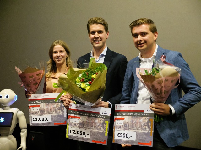 The winners of the GDBC Thesis Awards Digital Business 2022: Zoë Zwarts (left), Chris Remijn (centre) and Dylan Meyer (right) (photo: Hester Huizinga)