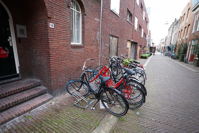 Bicycle stand in front of the door