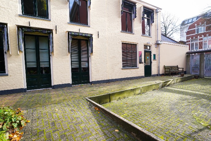 Ramp in courtyard to the main entrance of the building