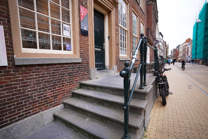 Main entrance of the building, stairs and treshold