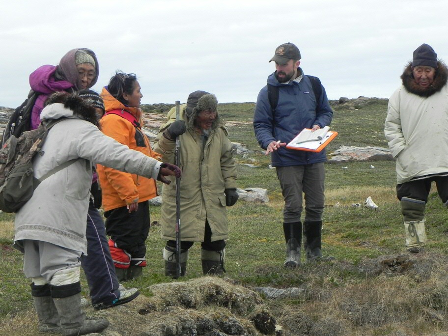 Inuit elders are showing Dejardins an old sod house site