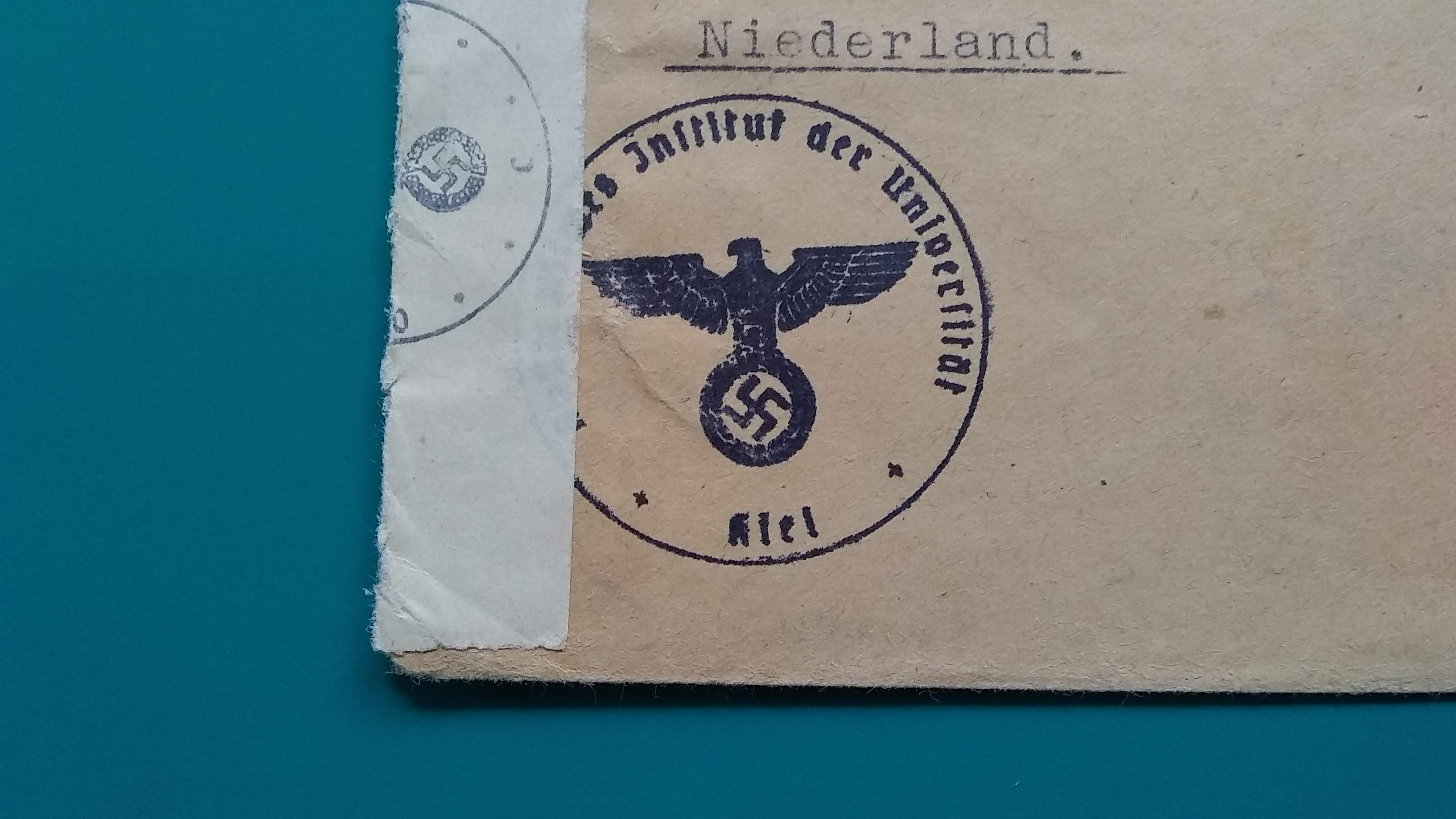 Stempel met hakenkruisStamp with swastika