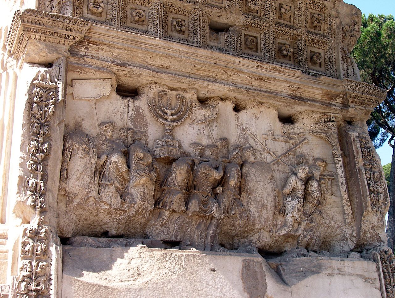 Close-up relief Arch of Titus showing the spoils from the siege of Jerusalem.