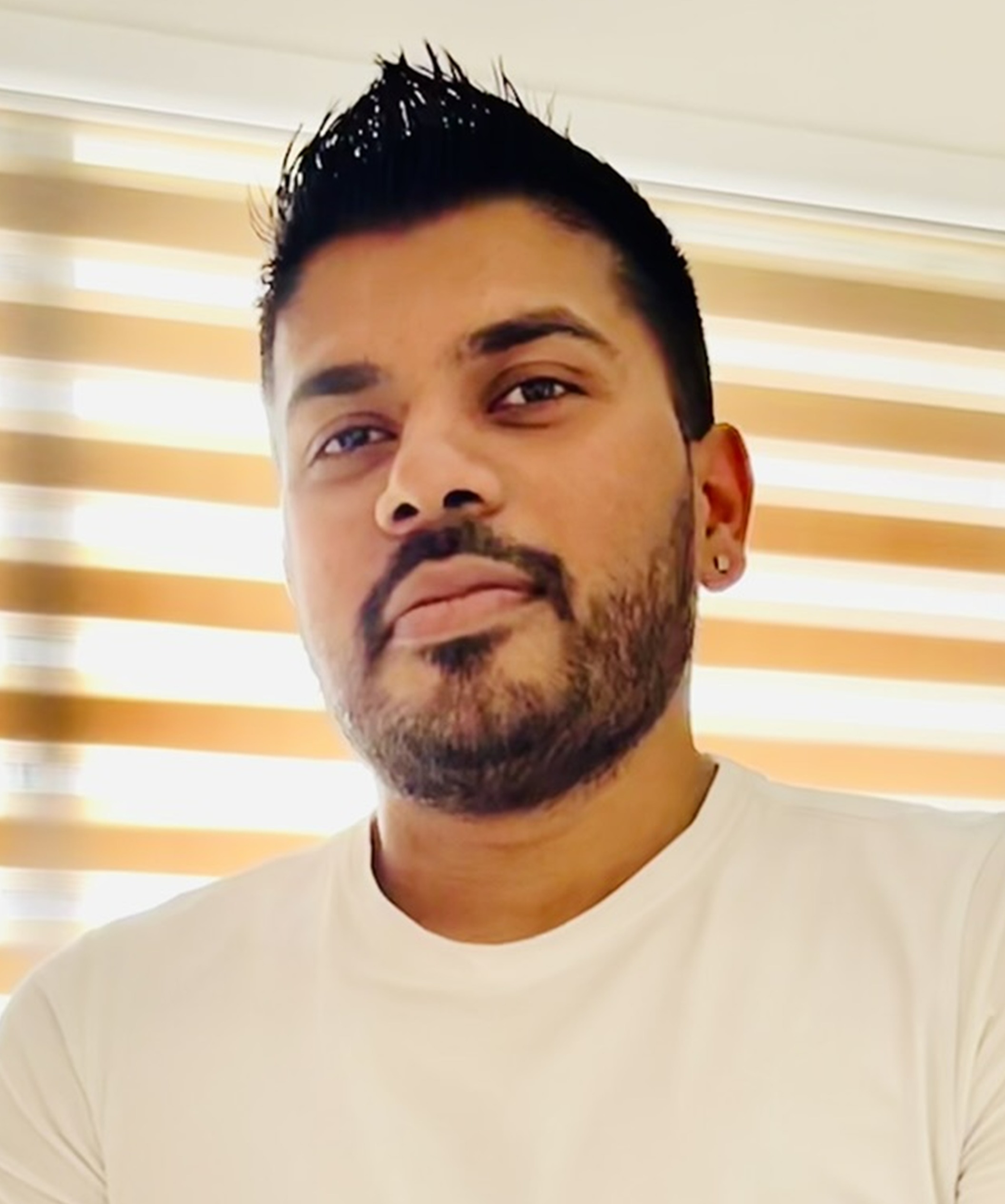 a profile picture of Debarun Sengupta a young man brunette wearing a T-shirt 