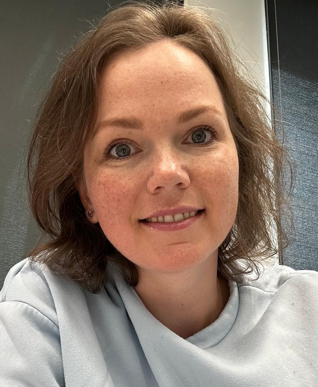 profile picture olga guseva smiling