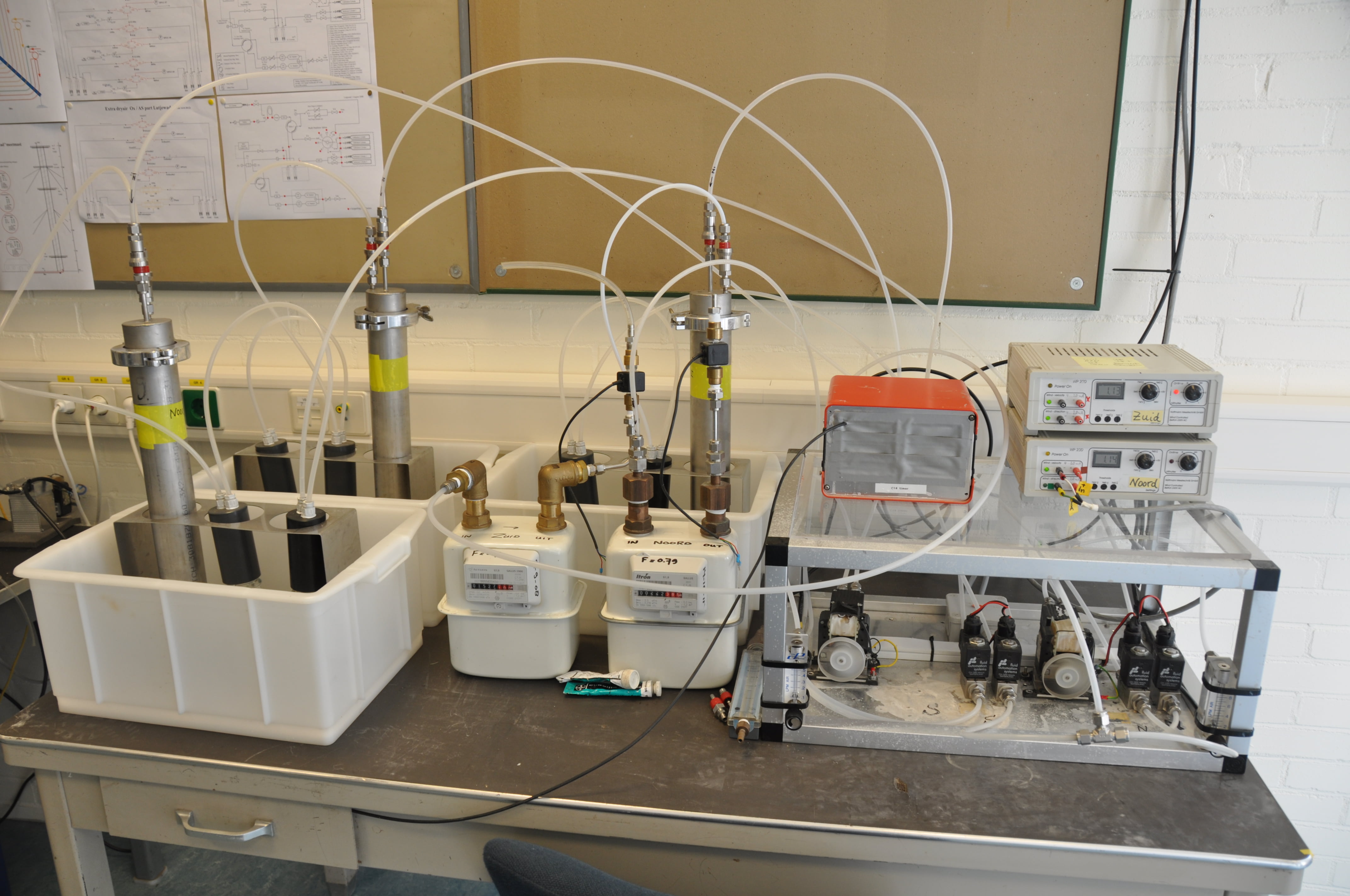 Absorption columns for C-14 determination (left) and ANSTO for Radon concentration (right)