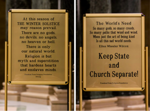 Back and front of a sign put up at the Wisconsin State Capitol by the Freedom From Religion Foundation.