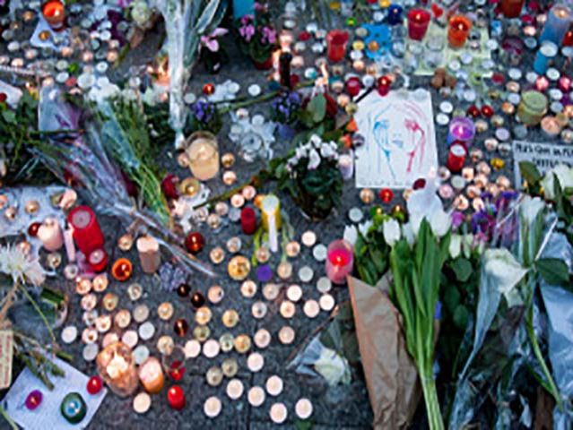 A street memorial in Paris following the November attacks. Source: Wikimedia. Licensed under the Creative Commons Attribution-Share Alike 2.0 Generic license.
