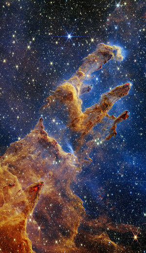 The Pillars of Creation are set off in a kaleidoscope of color in NASA’s James Webb Space Telescope’s near-infrared-light view. The pillars look like arches and spires rising out of a desert landscape, but are filled with semi-transparent gas and dust, and ever changing. This is a region where young stars are forming – or have barely burst from their dusty cocoons as they continue to form. Credits: NASA, ESA, CSA, STScI; Joseph DePasquale (STScI), Anton M. Koekemoer (STScI), Alyssa Pagan (STScI).