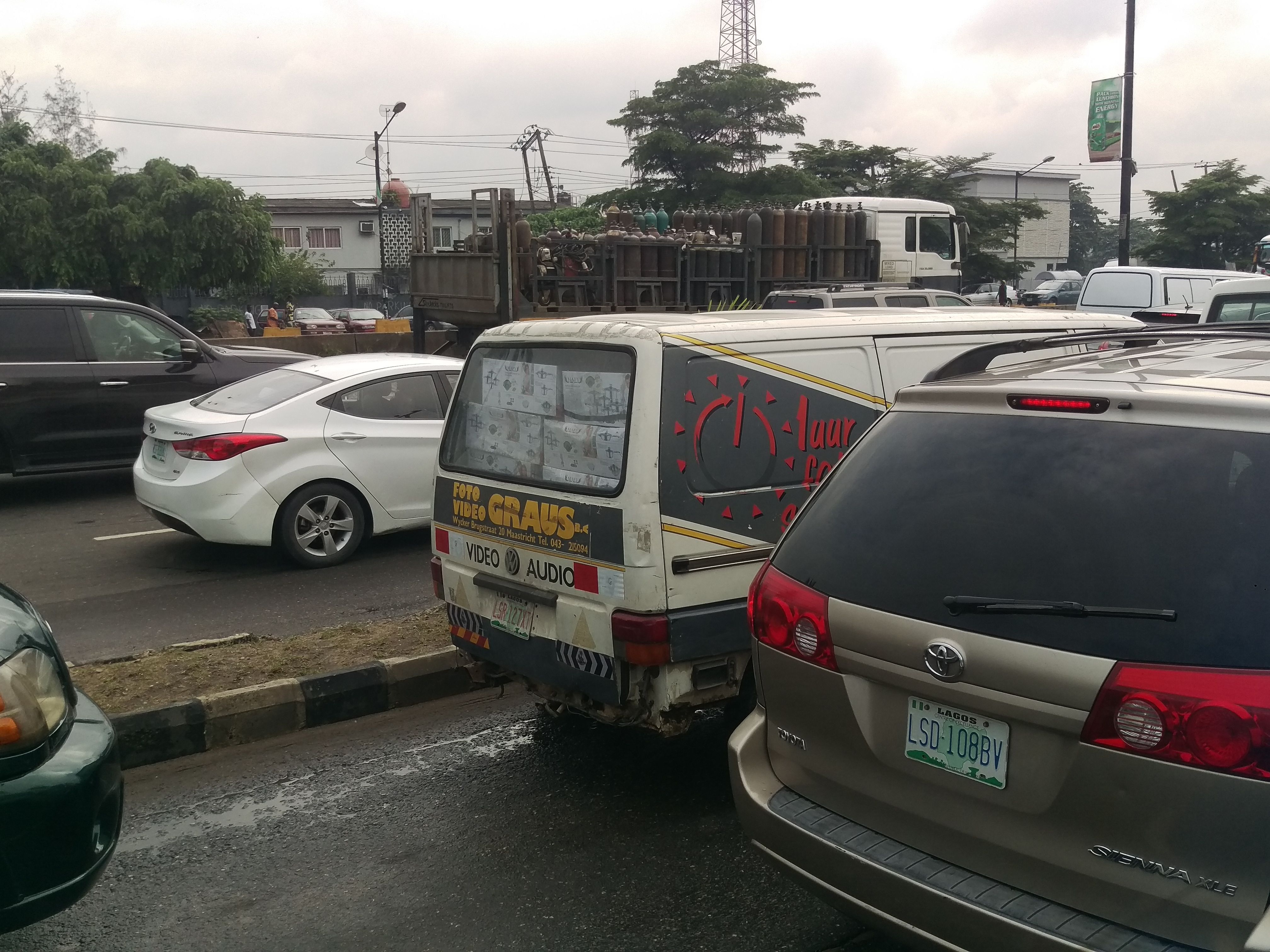 In Lagos, people say traffic because it seems there is almost no difference between normal traffic and traffic jams, since it is so busy. Always.