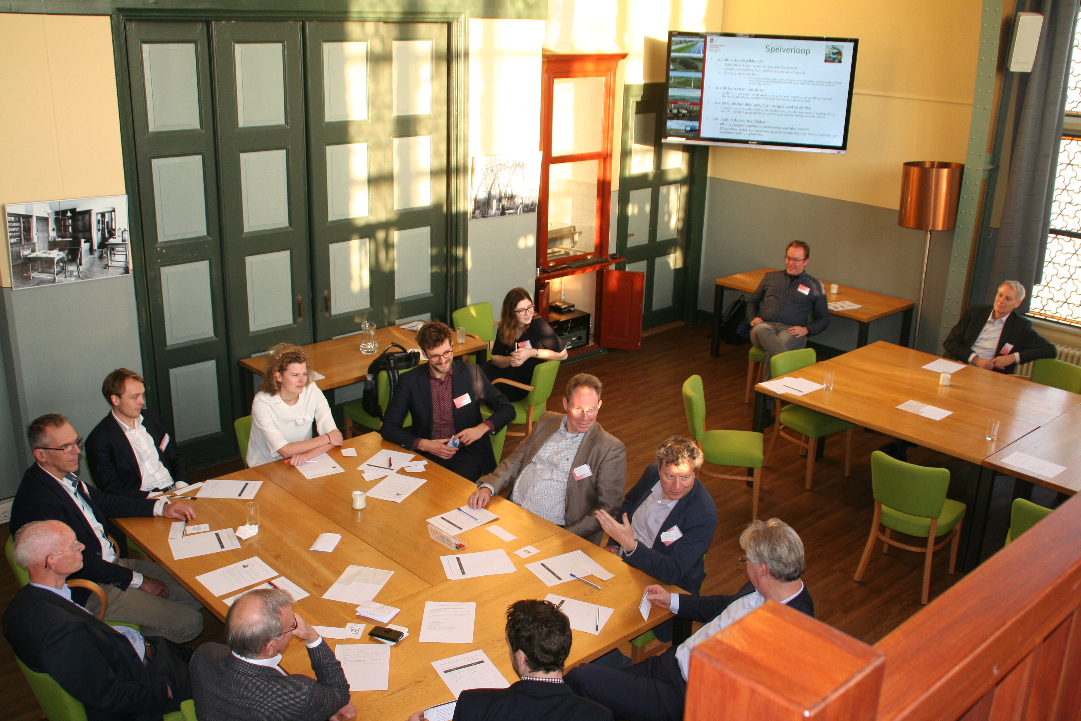 Overleg onder workshop deelnemers.
