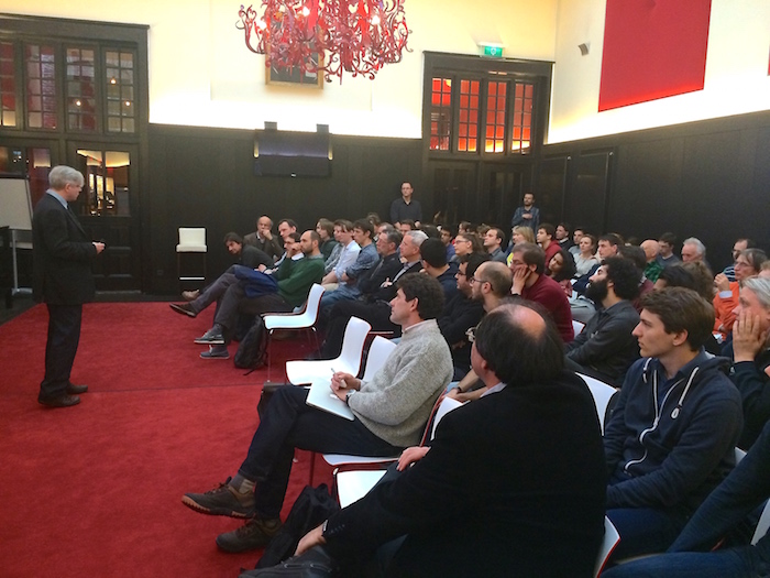 Prof. Ed Hinds (Centre for Cold Matter, Imperial College) is answering questions at the Symposium following his presentation on the use of cold atoms and molecules to address questions related to electron-EDMs, Dark energy and variation of the fundamental constants.