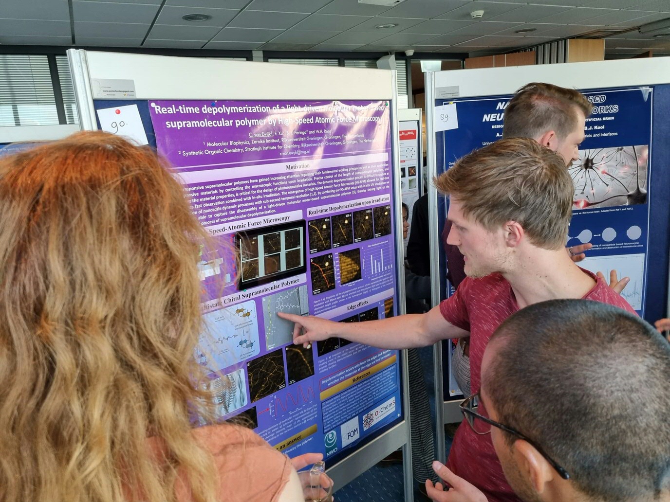 Chris van Ewijk (right) presenting his poster