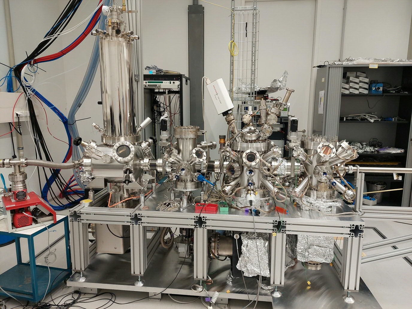 Low temperature (down to 2.8K) scanning probe microscope (STM and AFM) with superconducting magnetic coil.