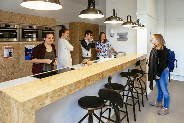 Students preparing lunch in the UCG kitchen