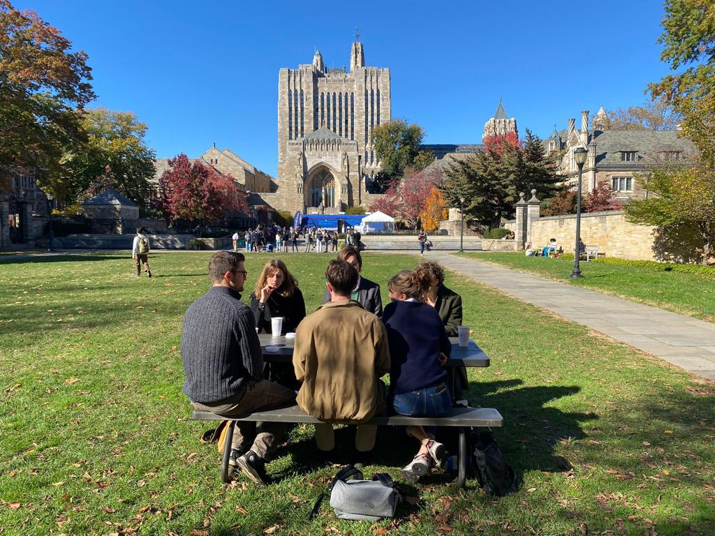 Students discussing the next session at Yale University